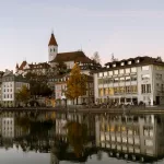 a body of water with buildings along it