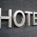 a hotel sign on the side of a building
