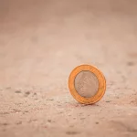 silver and gold round coin